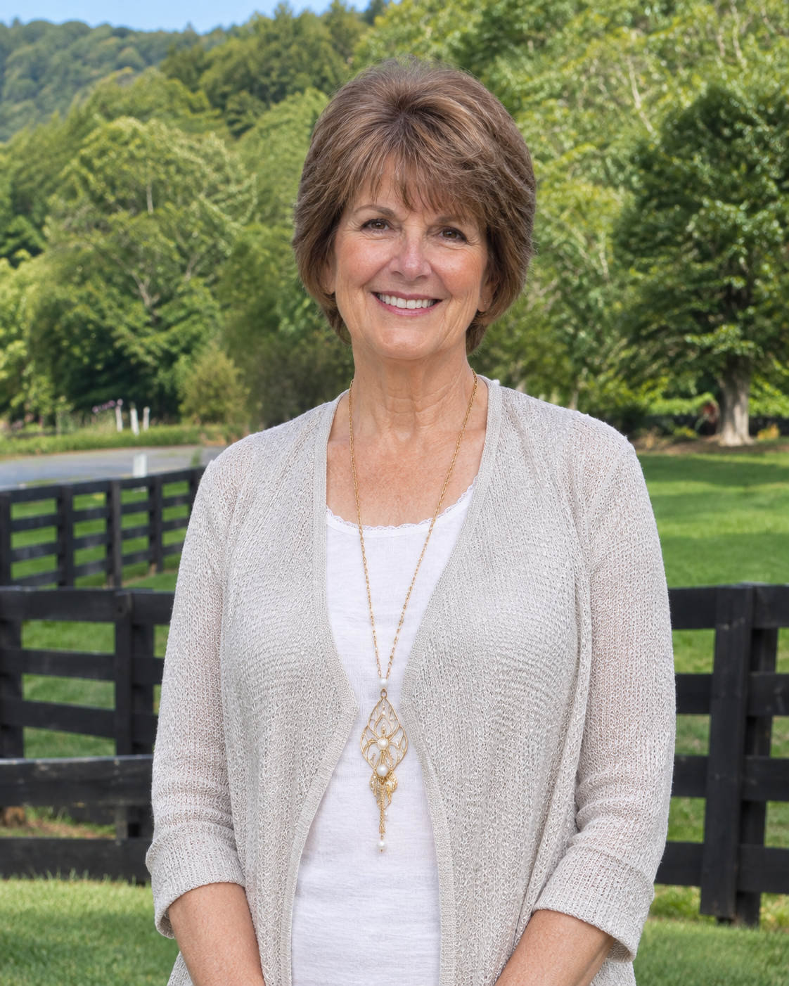 Brenda Tharp with chestnut-brown hair in a garden